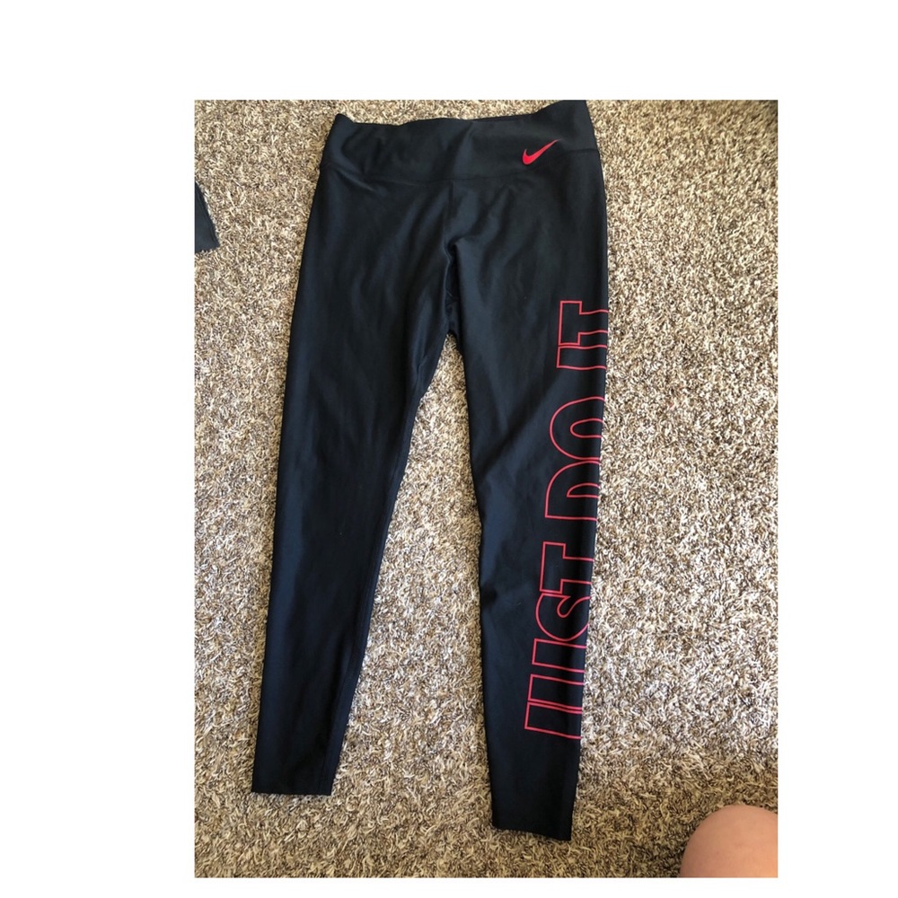 Nike pants, red decal